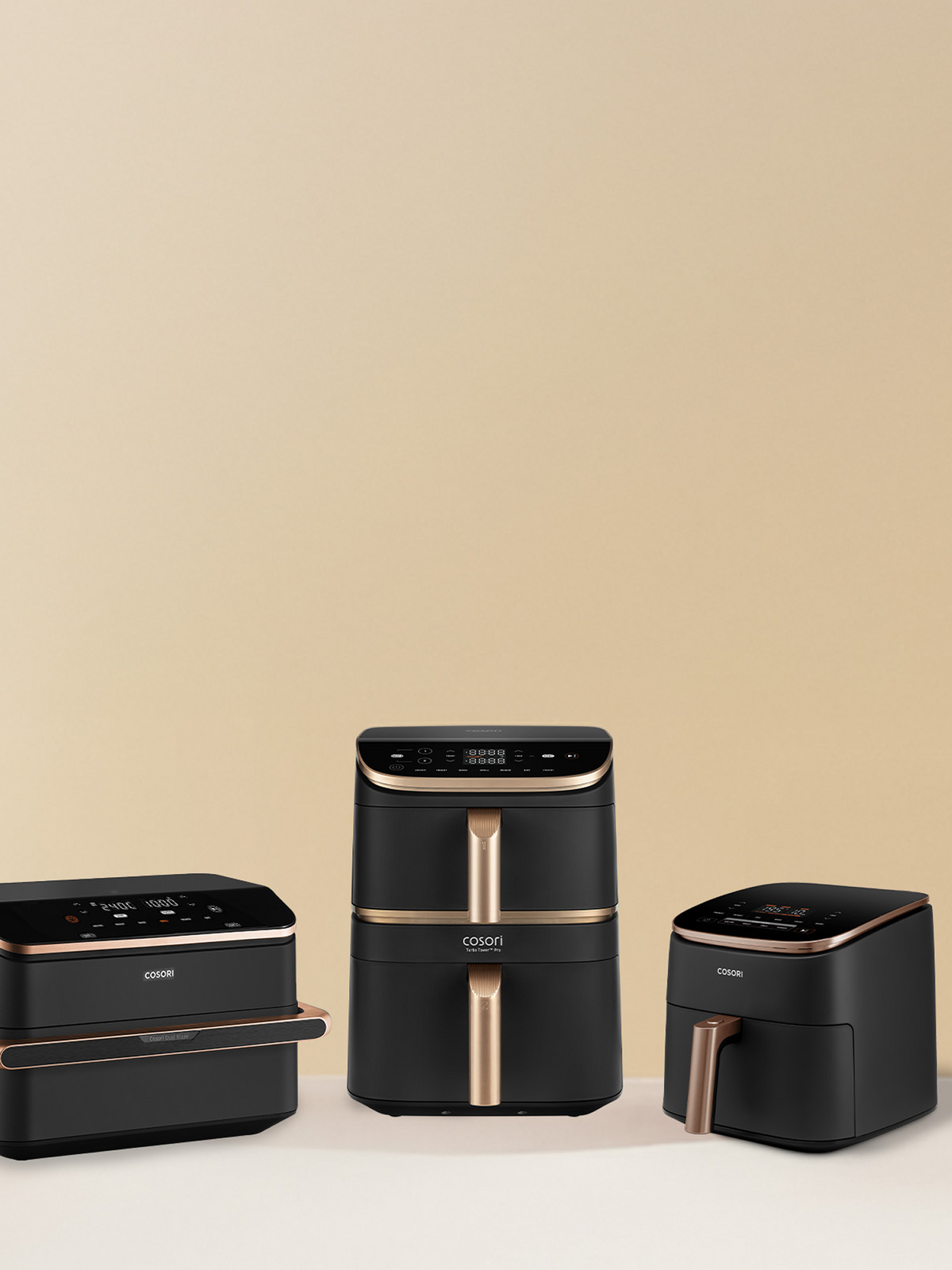COSORI Heißluftfritteusen in elegantem Schwarz mit Kupferdetails – moderne Airfryer für gesundes, fettarmes Kochen.